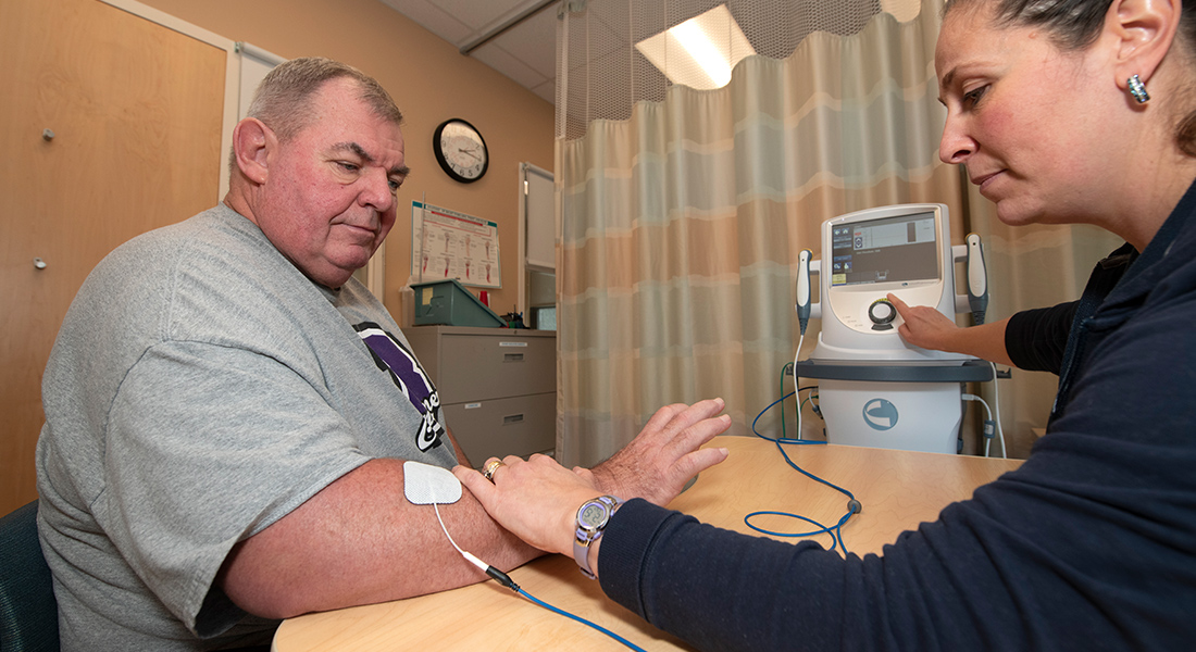 Patient getting blood pressure taken at Spaulding Rehabilitation Hospital Cape Cod