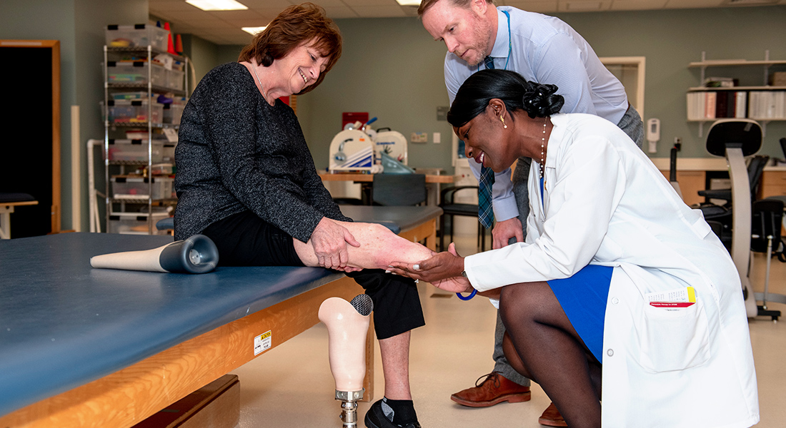 Patient with prosthetic leg rehabbing at Spaulding Rehabilitation Hospital Cape Cod