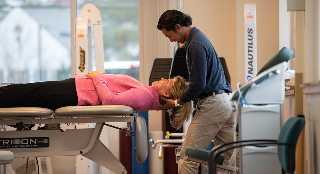 Physical therapist rehabbing patient at Spaulding Outpatient Center Plymouth