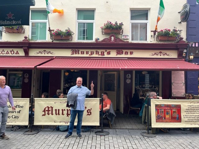 Andy outside of a pub