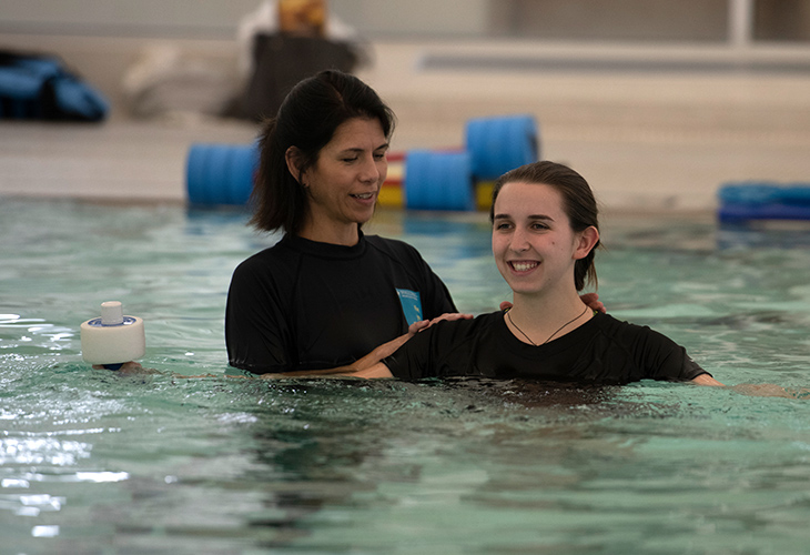 Hanover Outpatient team member assisting patient with aquatic therapy