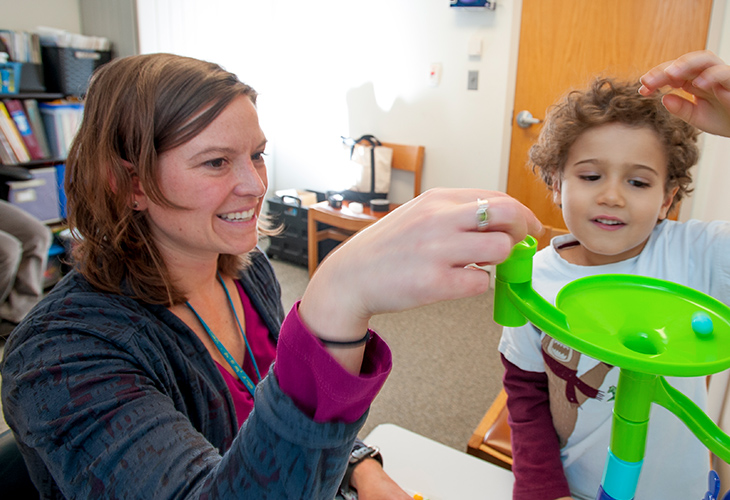 Lexignton Childrens Outpatient team member assisting pediatric patient with rehab