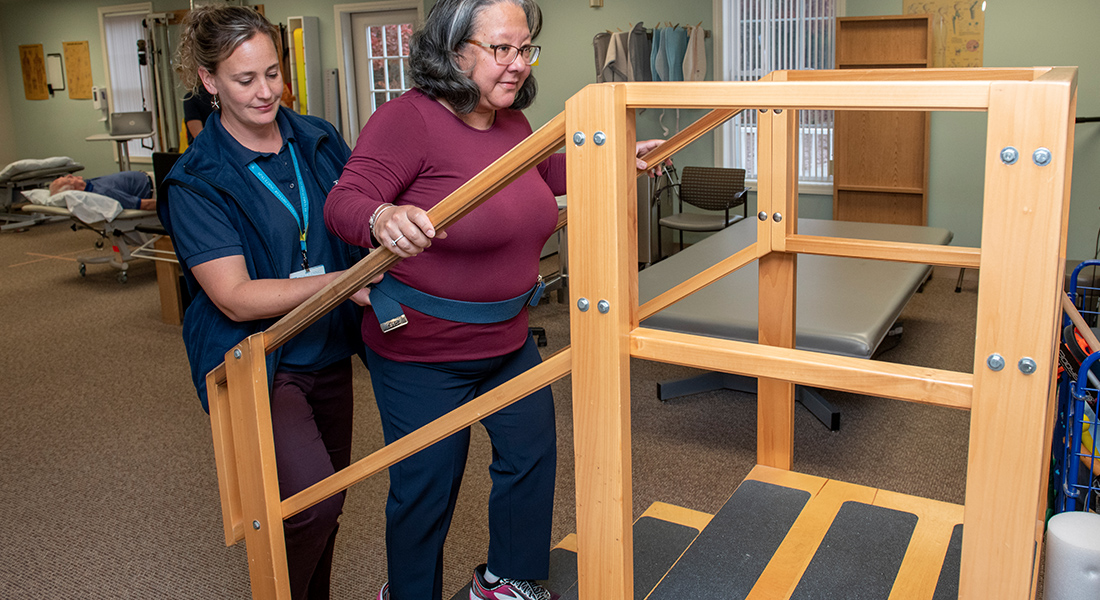 Patient rehabbing with steps at Spaulding Outpatient Center Yarmouth